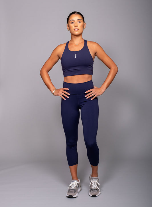 Dökkbláar stretch tech cropped leggings